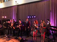 Live swing and soul musicians performing at a wedding reception at Eltham Palace, London