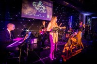 Live swing and soul function band performing at charity ball in Brighton Grand Hotel