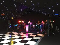 Live function band soundchecking at a wedding reception - Creslow Manor, Buckinghamshire