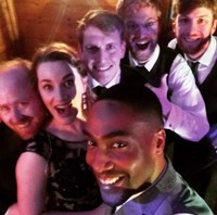 Live swing band performing at a wedding at Lains Barn, Oxfordshire