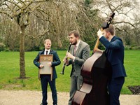 Instrumental jazz trio performing roaming acoustic walkabout music for a London wedding drinks reception