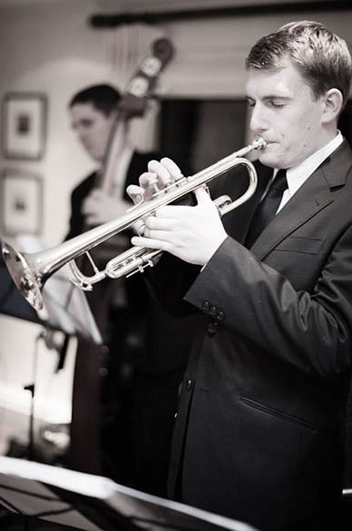 Swing band Down for the Count performing at Natalie & Andrew's Wedding Reception with Down for the Count at Coworth House, Berkshire. Photo courtesy of Barker Evans (http://www.barkerevans.com/)