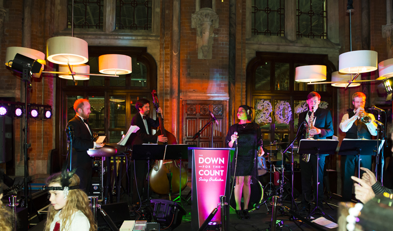 Vintage Swing Band Down for the Count performing at a 1920s themed event at the Booking Office, St Pancras Renaissance Hotel, New Year's Eve 2014.  Photos courtesy of the Booking Office and Marius Bukis (www.mbphotos.eu).