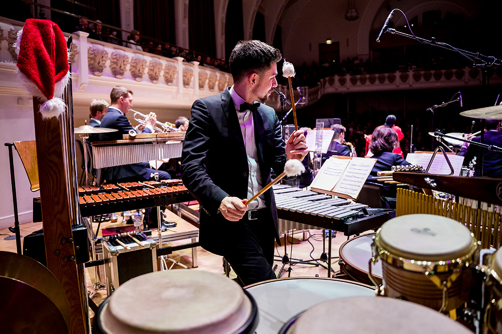 Percussionist Jordan Murray performing with Down for the Count Orchestra