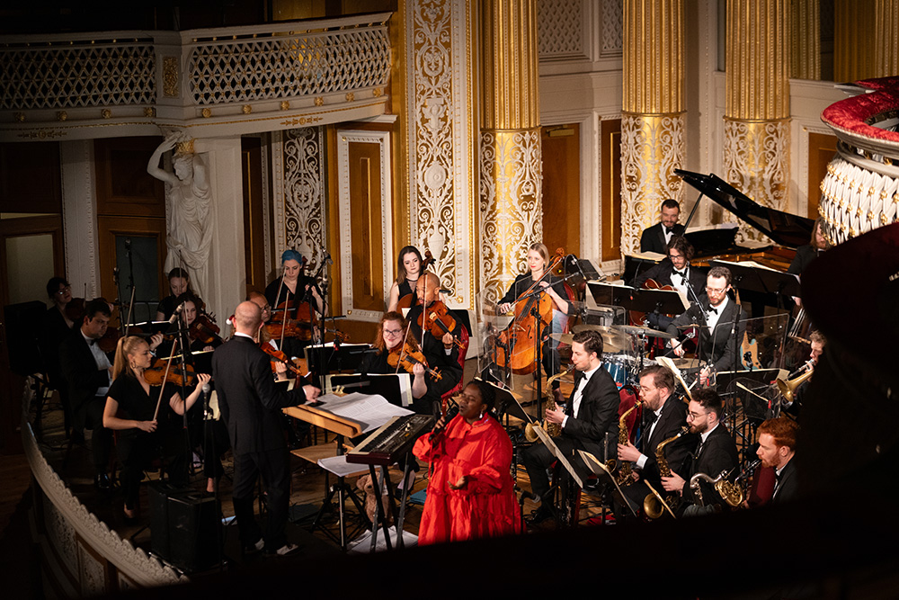 Violinist Auguste Copeland performing with Down for the Count Orchestra