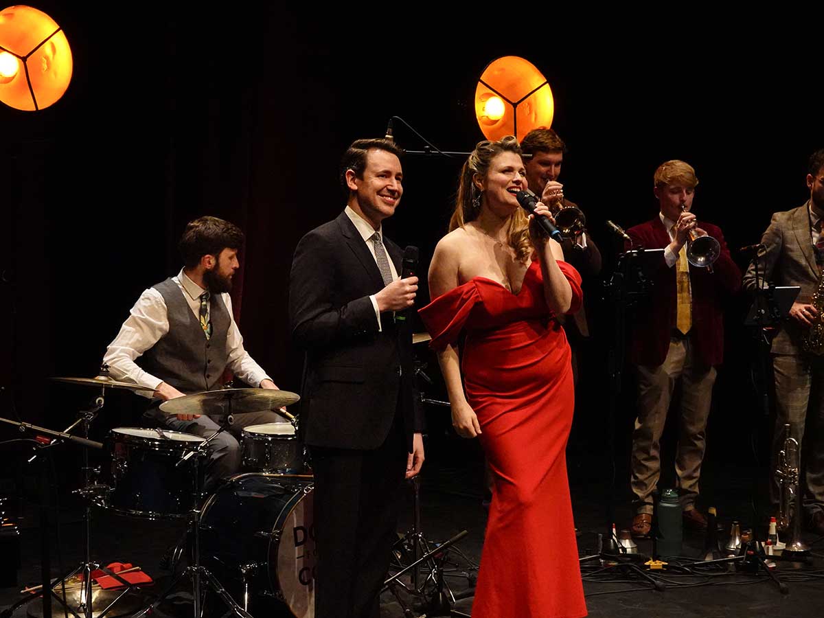 Vocalists Katie Birtill and Sam Furlonger performing with the Down for the Count All-Stars