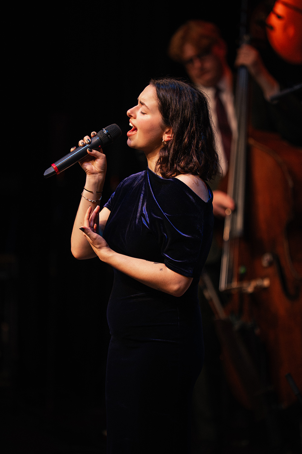 Vocalist Grace Sheene performing with Down for the Count