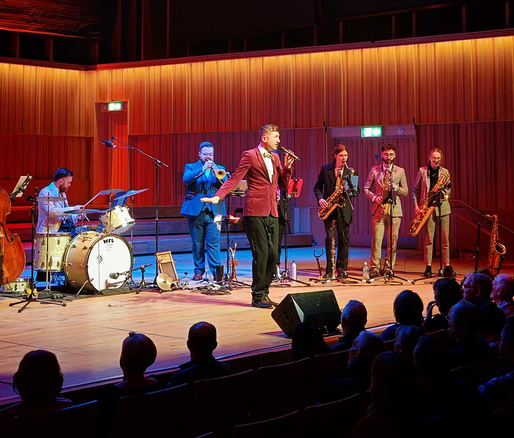 Arthur Geldard performing with Down for the Count All-Stars at Royal Birmingham Conservatoire