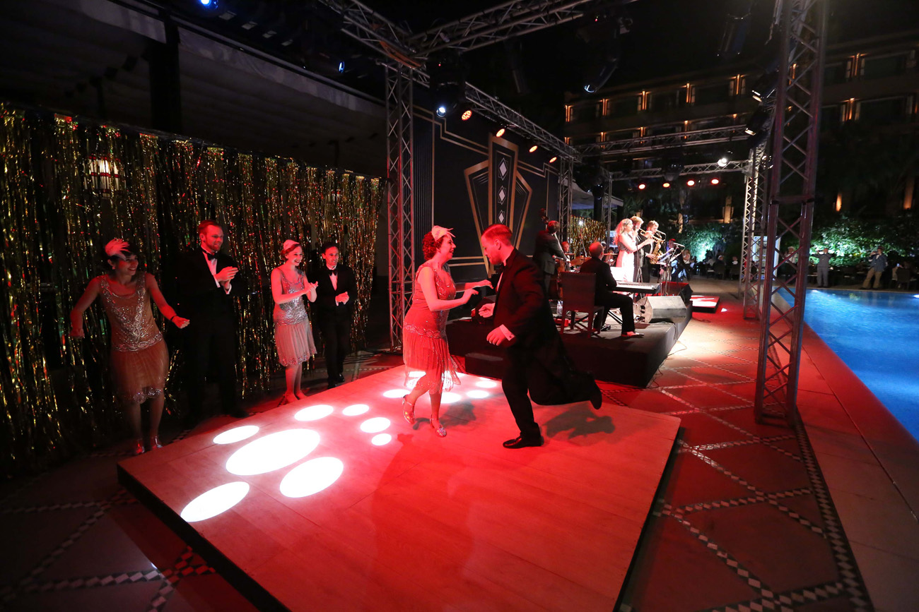 Vintage swing dancers entertaining the crowd at a Great Gatsby themed event at La Mamounia Hotel, Marrakech, Morocco