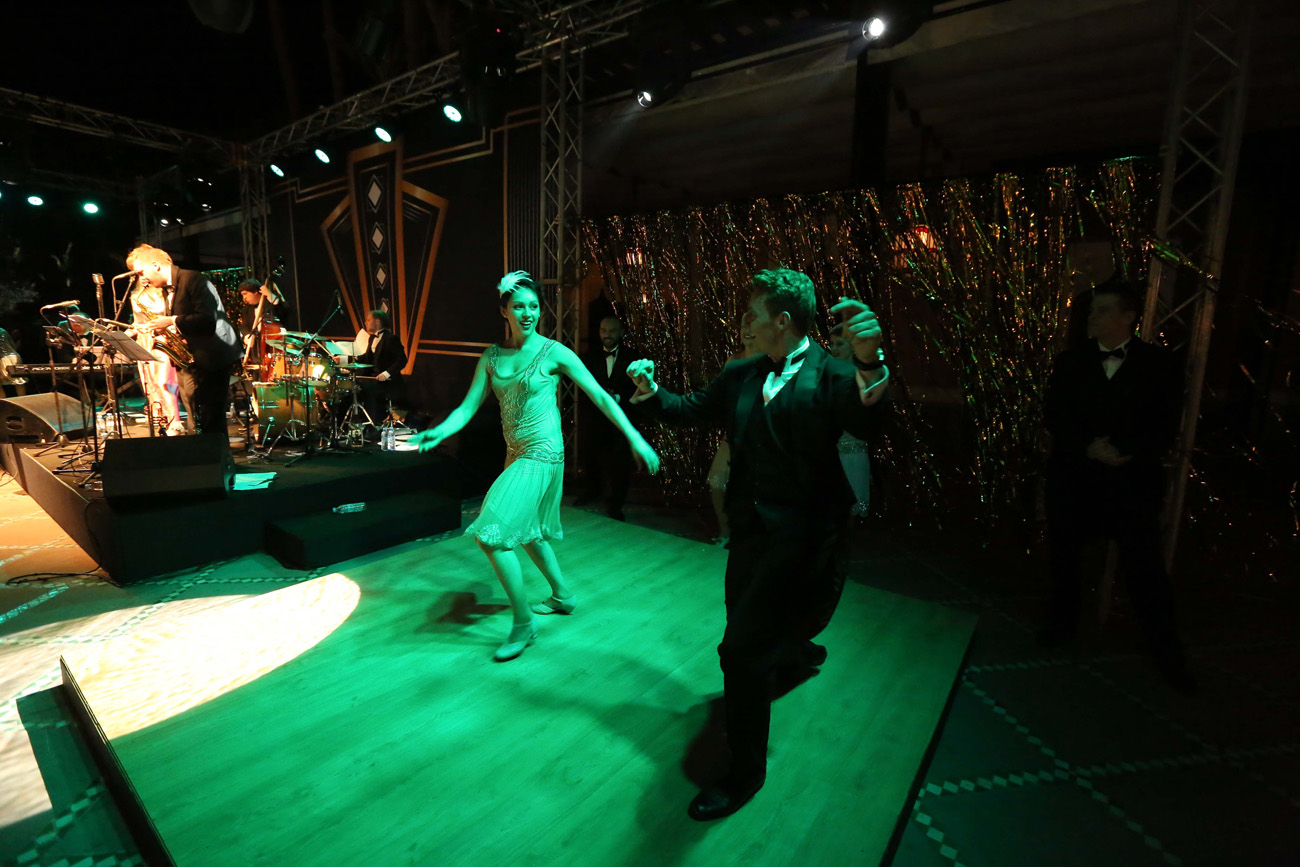 Vintage swing dancers performing with live band Down for the Count at La Mamounia Hotel, Morocco